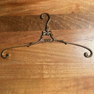 Brass clothes hanger